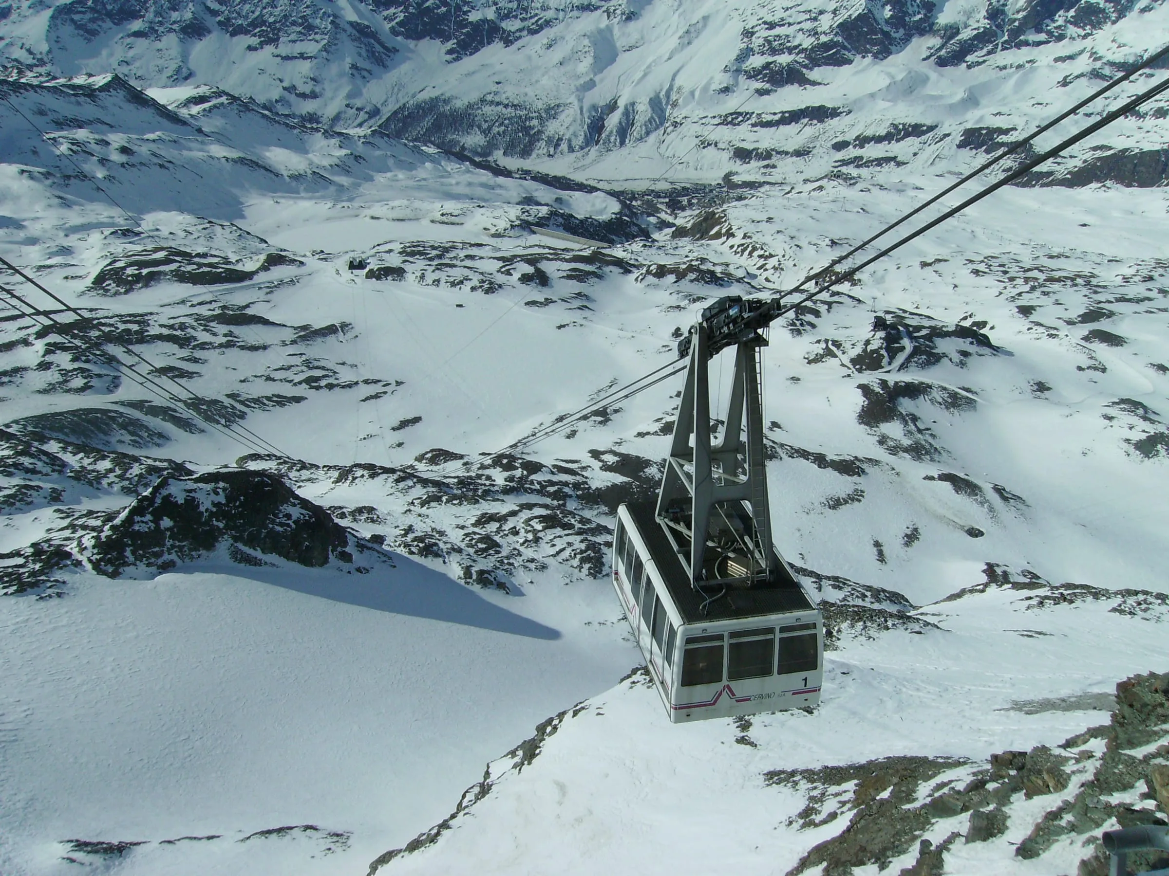 The Plateau Rosa cable car above the snowy Breuil-Cervinia ski area