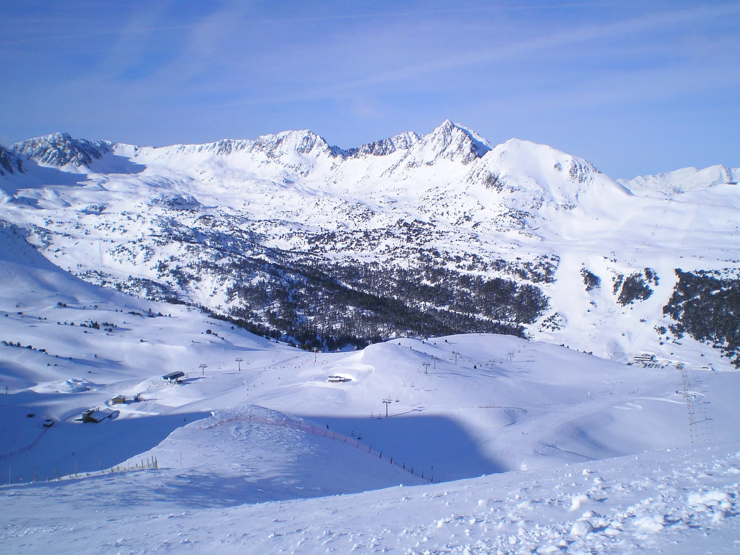 Snowy mountains above Grau Roig in the Grandvalira ski area