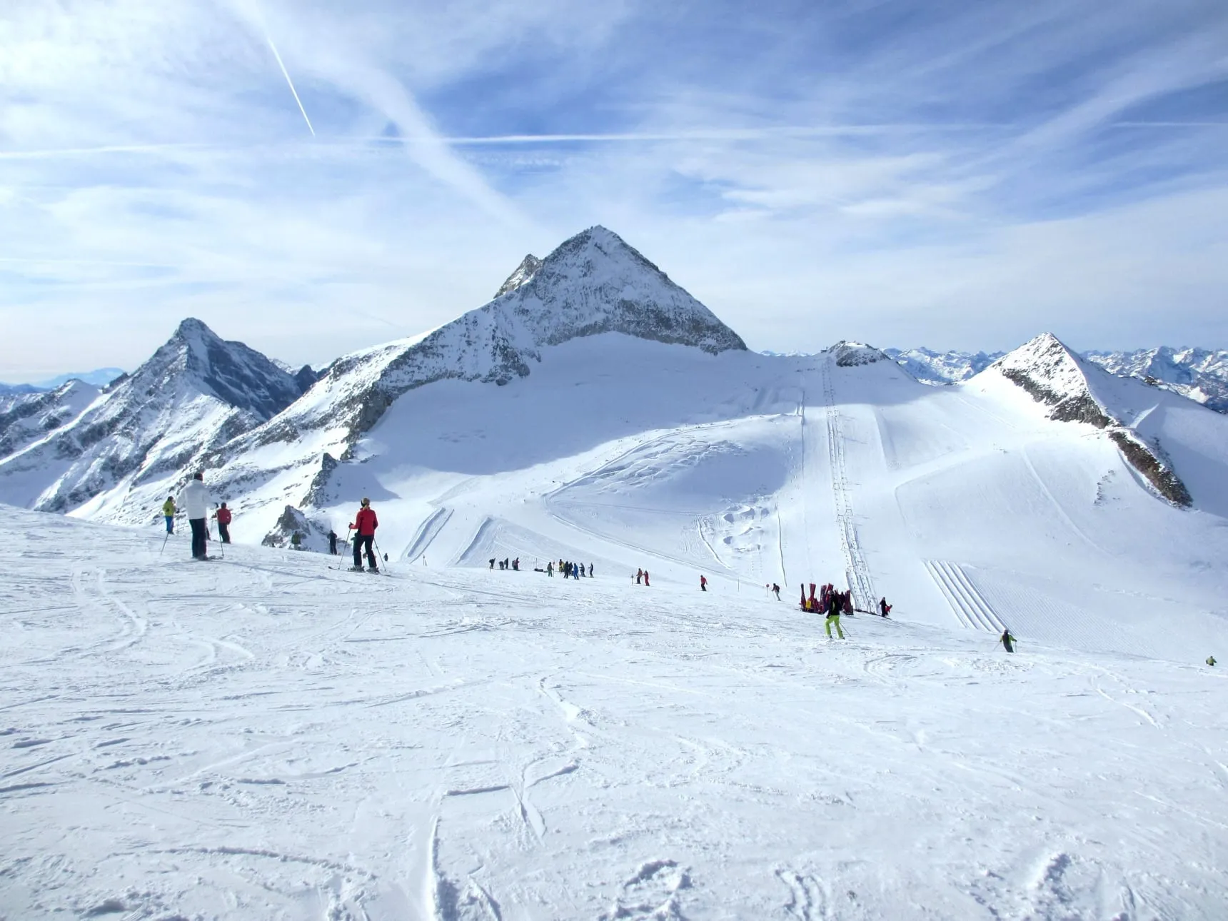 Skiers on the Hintertux Glacier pistes below the Olperer peak in winter