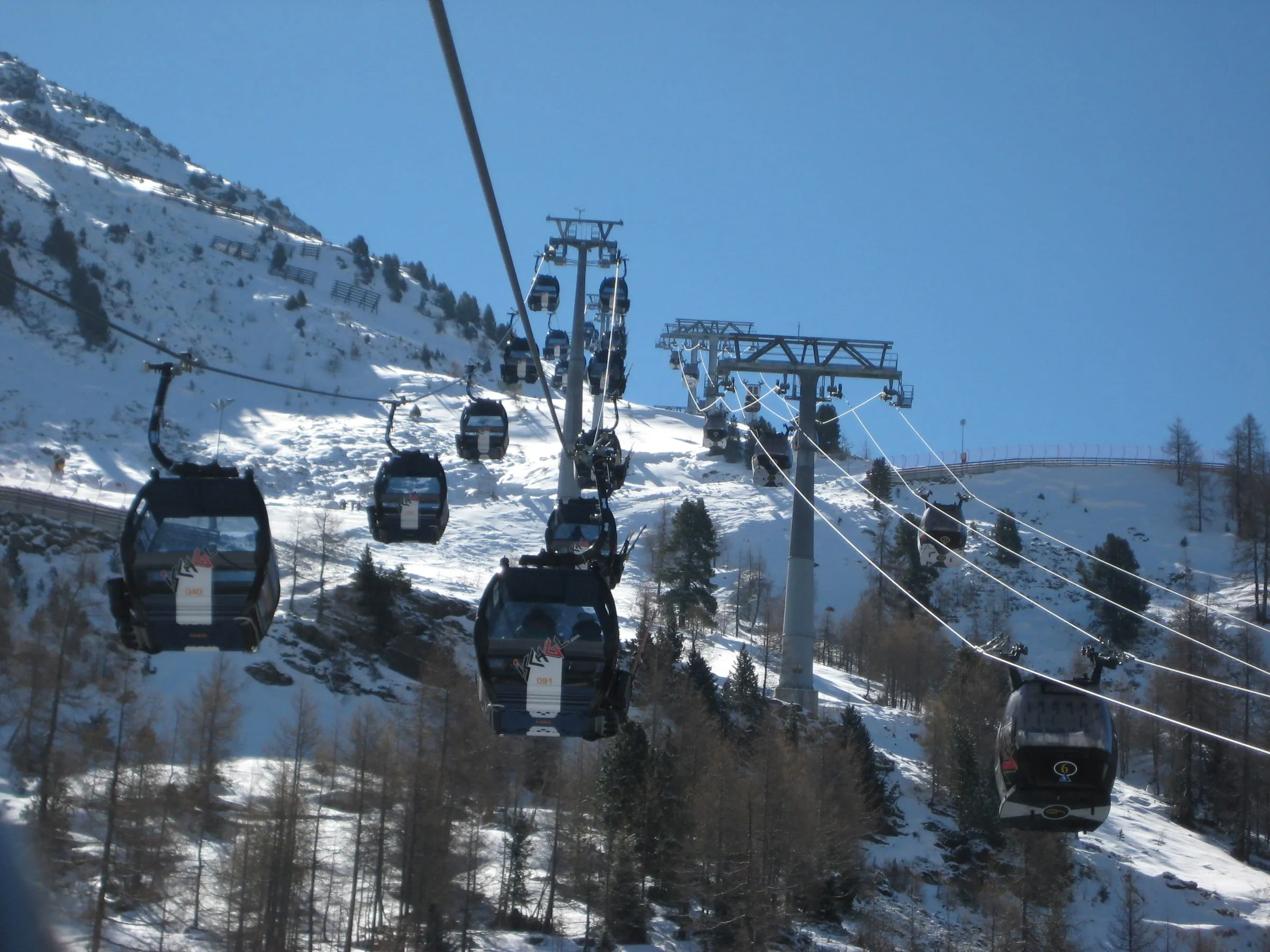 Fimbabahn and Silvrettabahn gondola cabins above snowy slopes near the Idalp in Ischgl