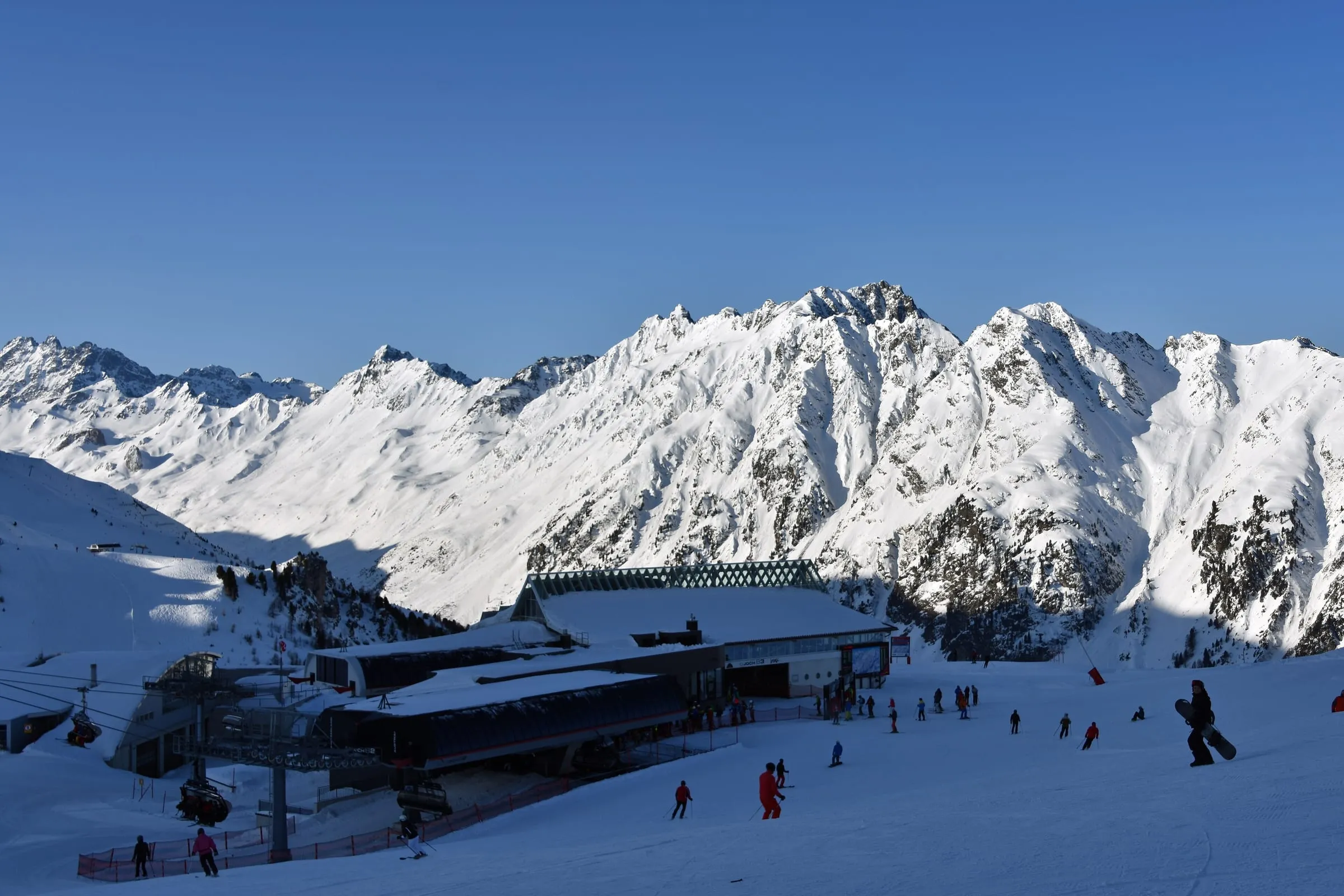 The Idalp mountain station and pistes above Ischgl on a sunny winter day