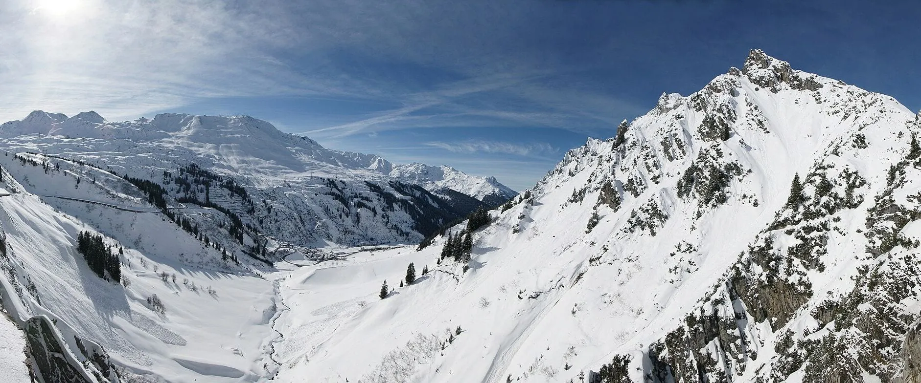 Panoramic view of the snowy Flexen Pass road leading to Zürs and Lech