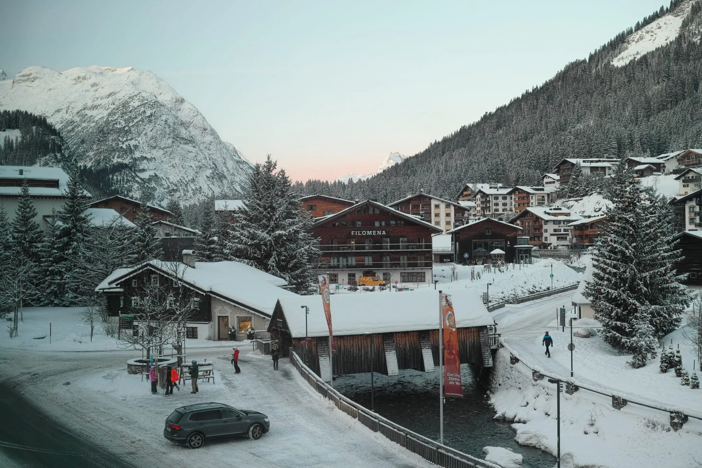 Chalet-style hotels in the centre of Lech am Arlberg after snowfall