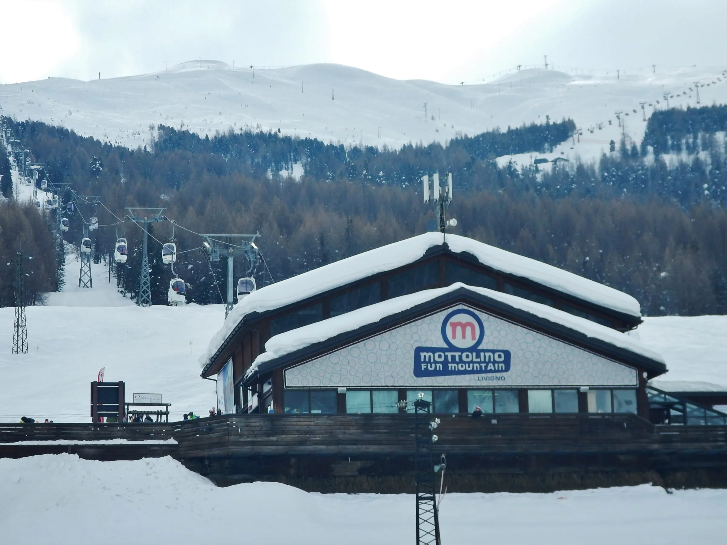 The Mottolino Fun Mountain building and lifts in Livigno in winter