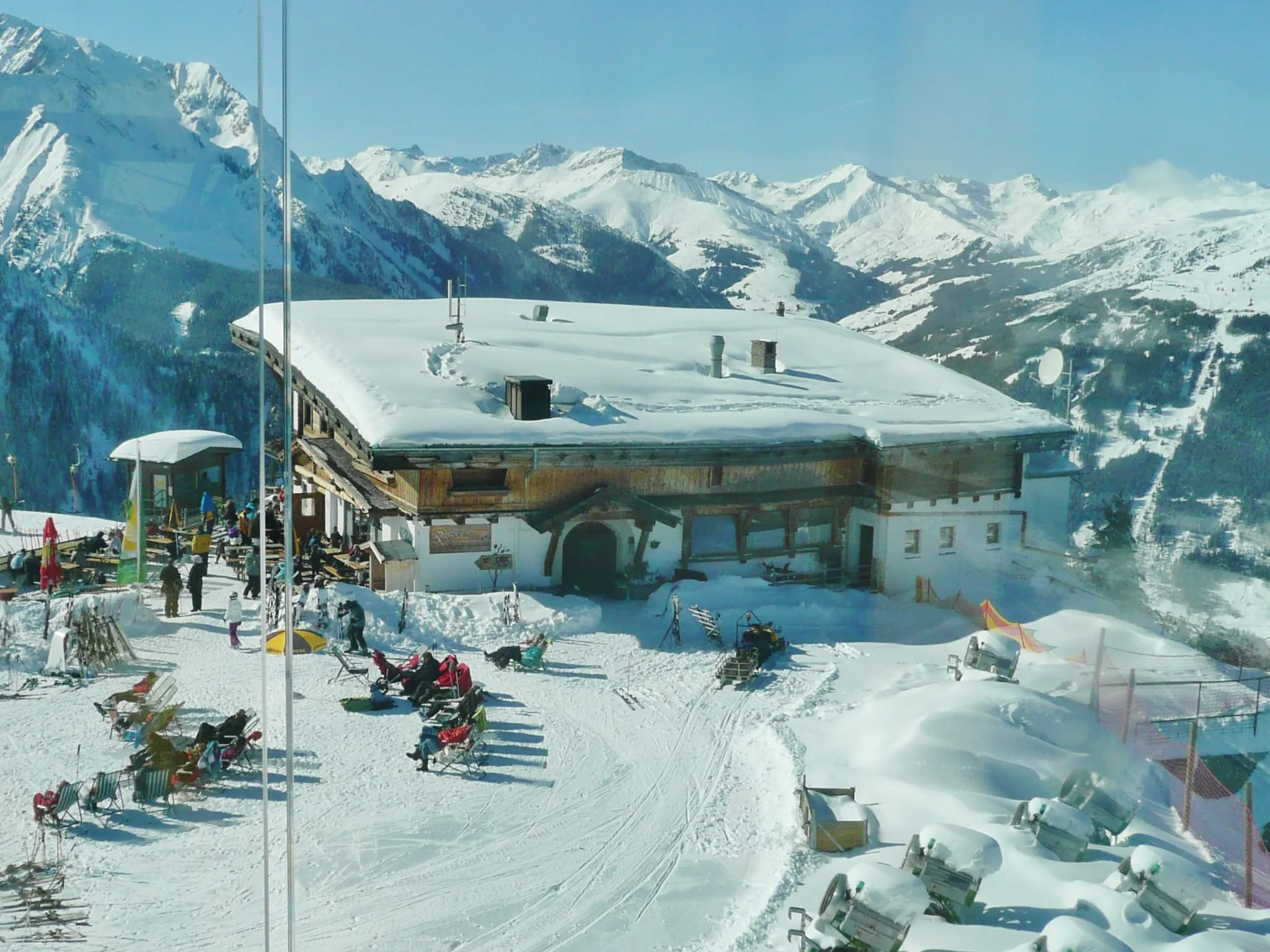 Skiers outside the Panoramahütte on the Ahorn, Mayrhofen, in winter