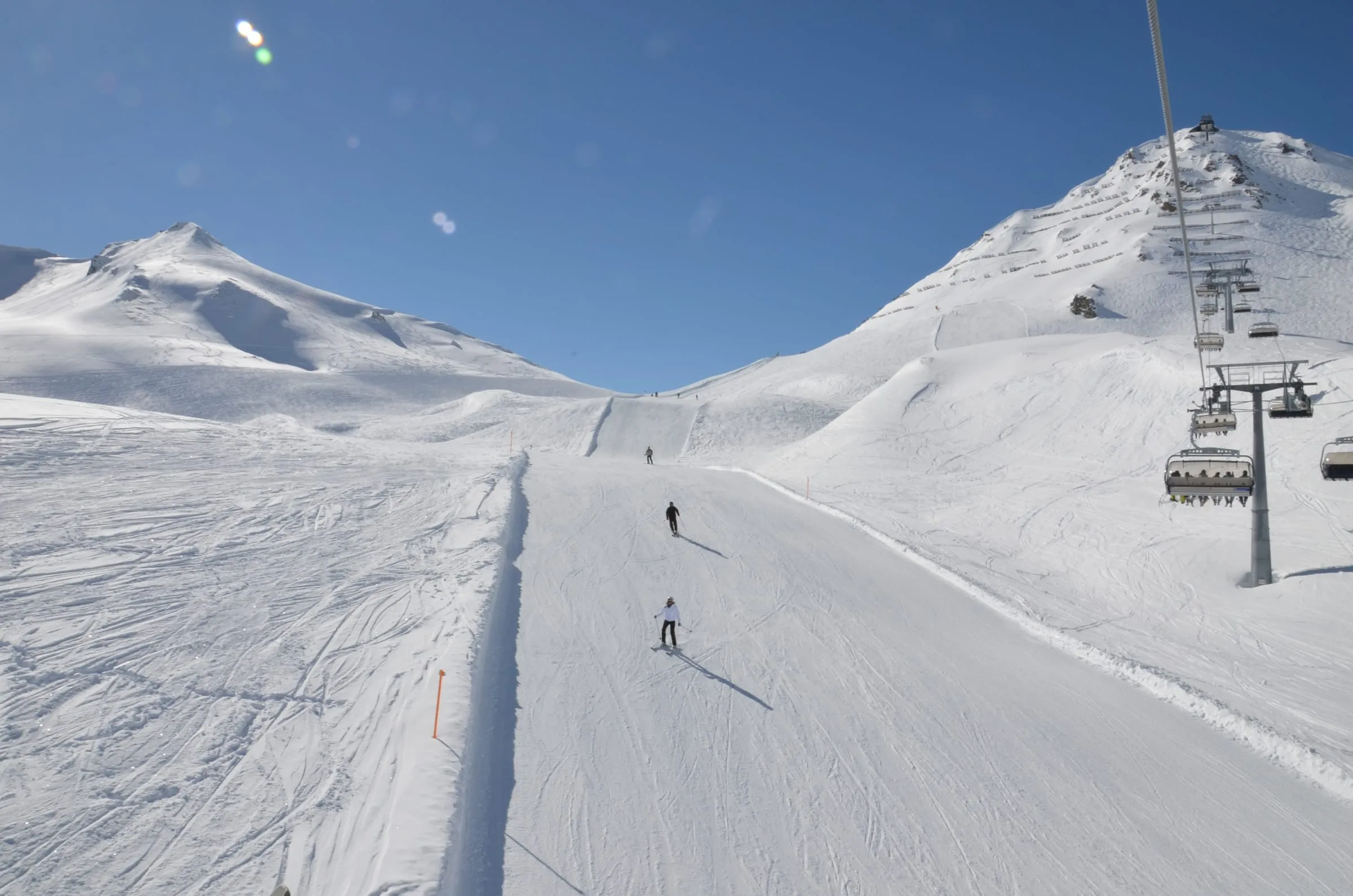 A groomed piste and chairlift in the Serfaus-Fiss-Ladis ski area