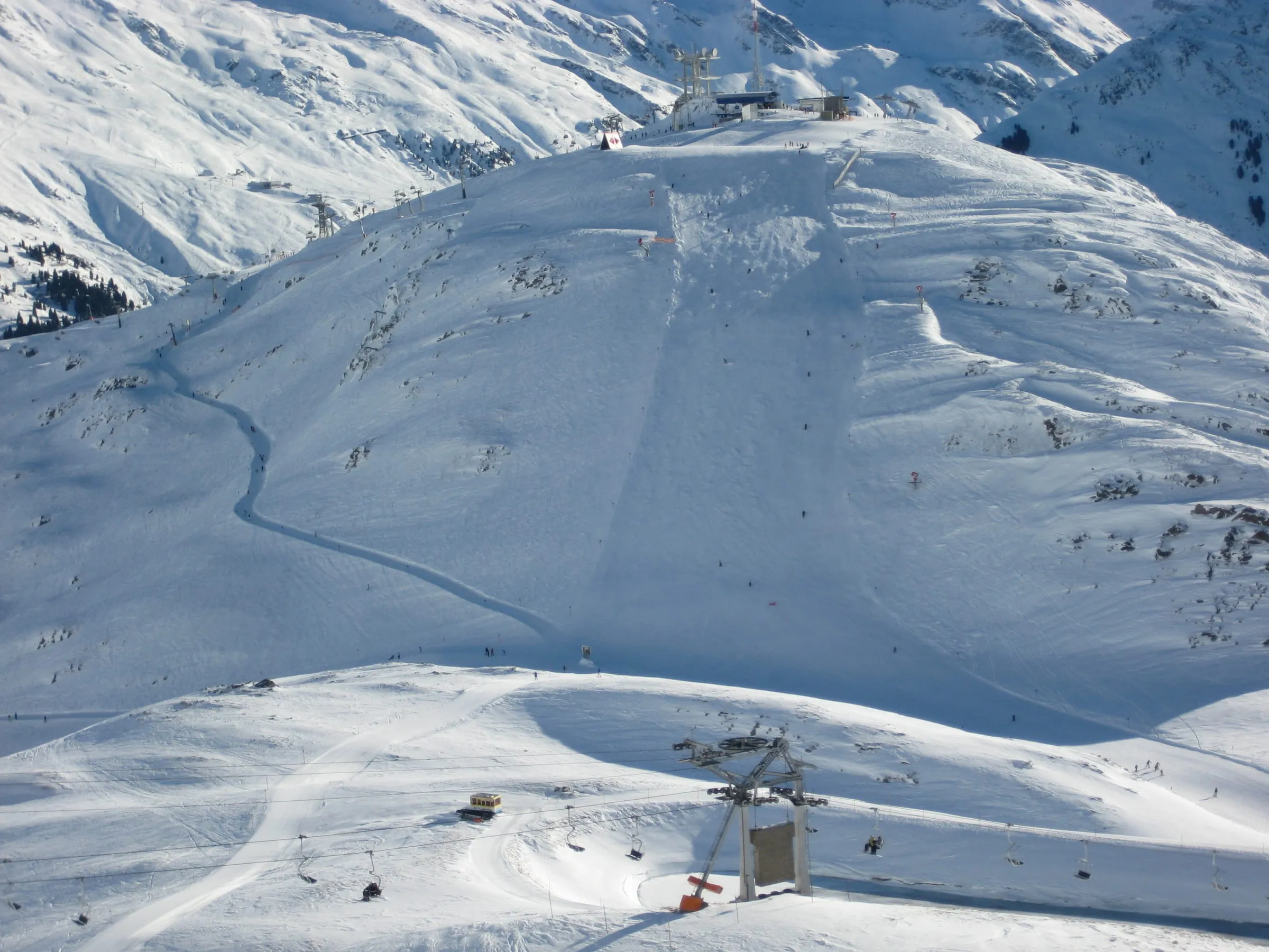 Snowy pistes and lifts on the Galzig above St. Anton am Arlberg, seen from the north