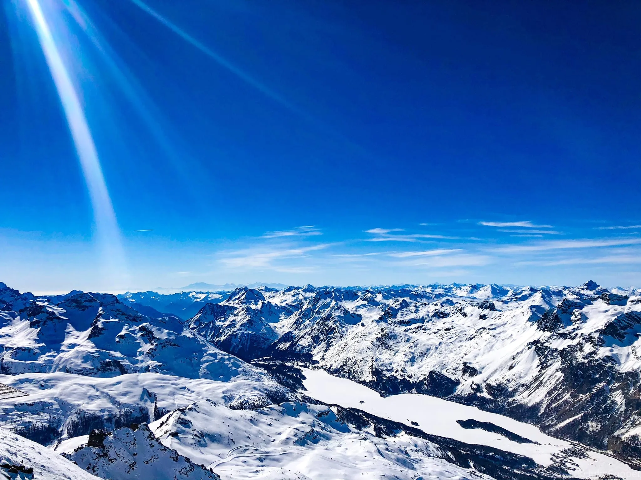 Snowy peaks of the Upper Engadine seen from the Corvatsch top station at 3,303 m