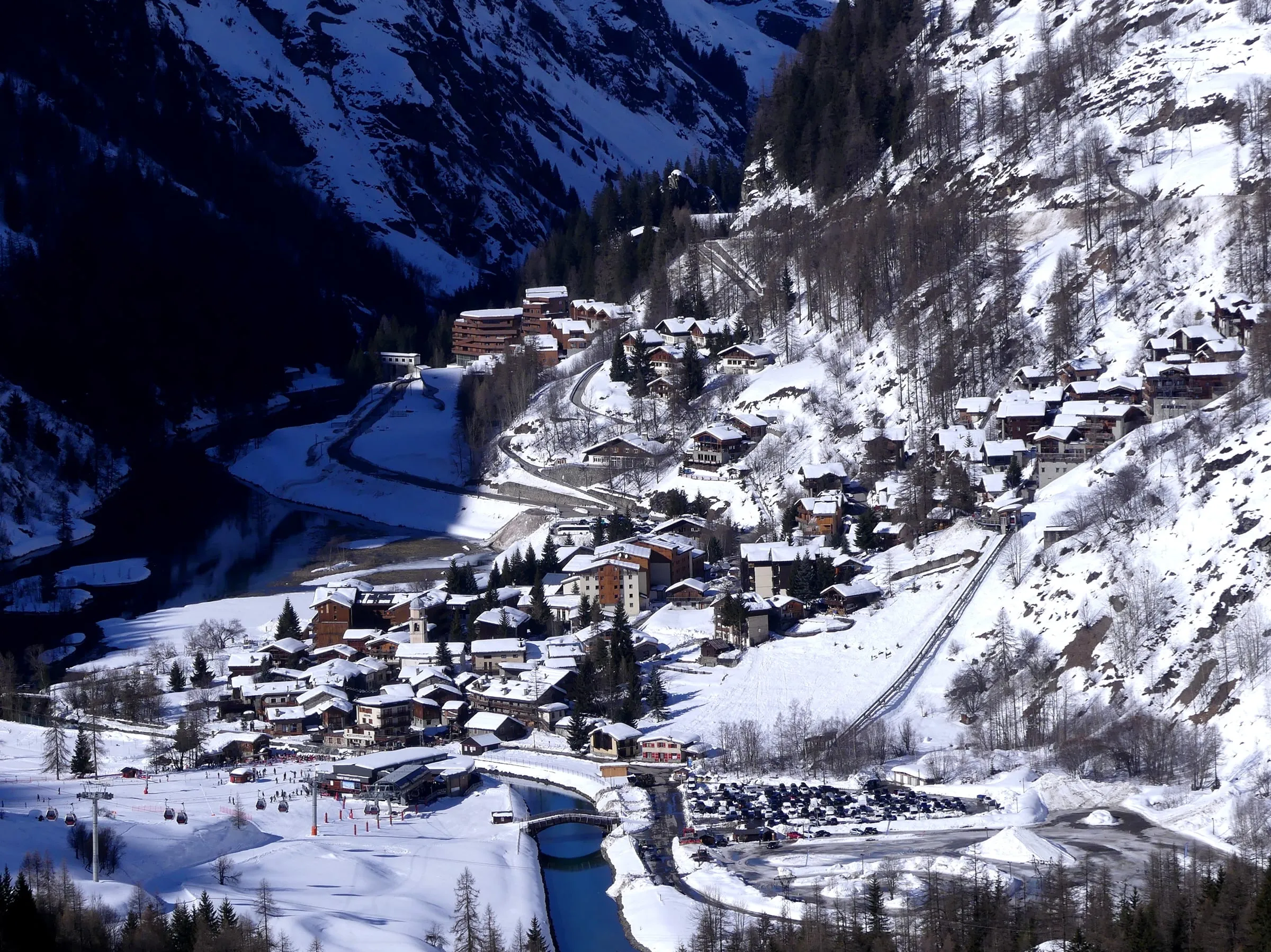 Les Brévières village in the snow below the Tignes dam