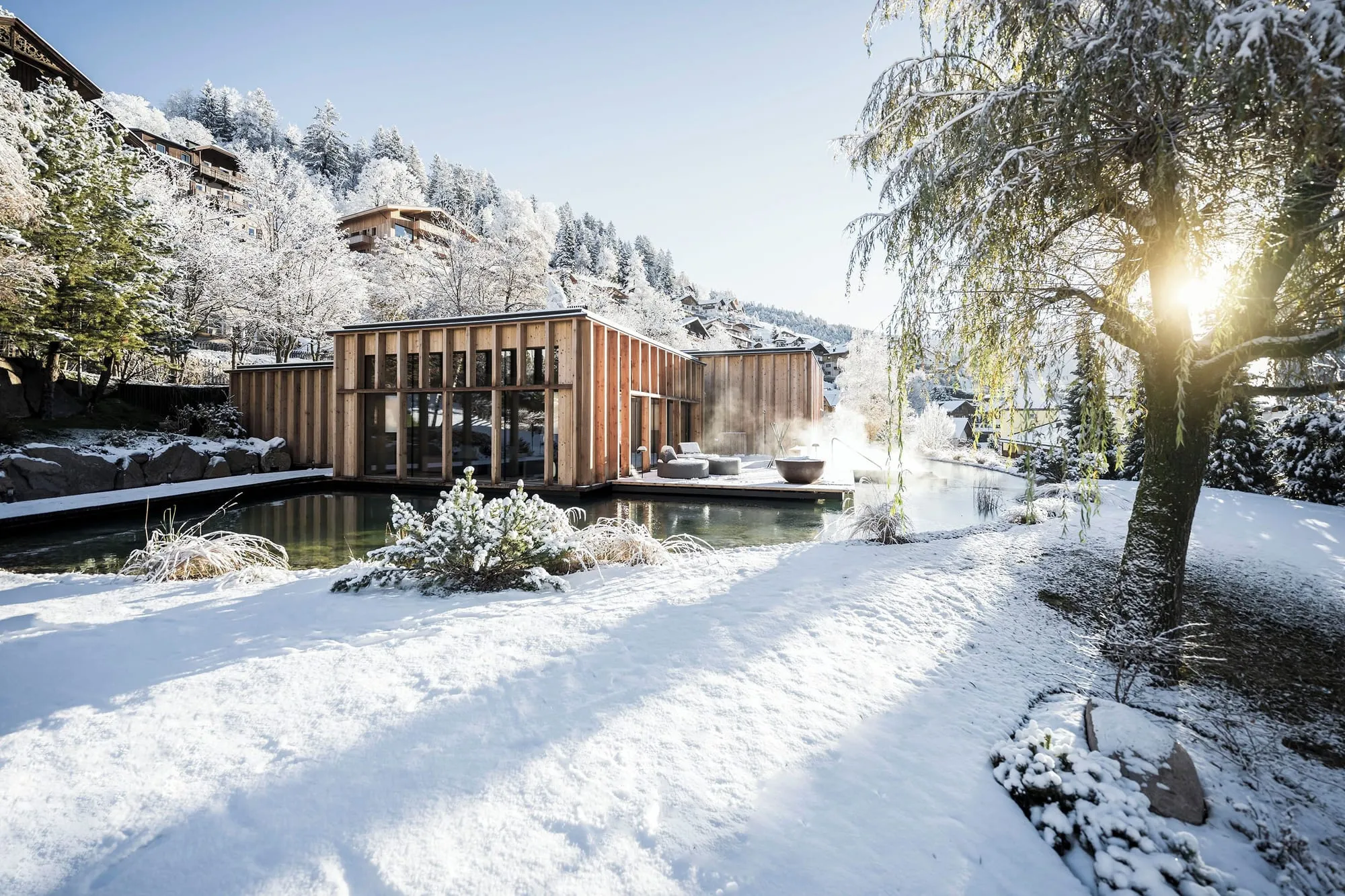 ADLER Spa Resort Dolomiti: the hotel garden in winter