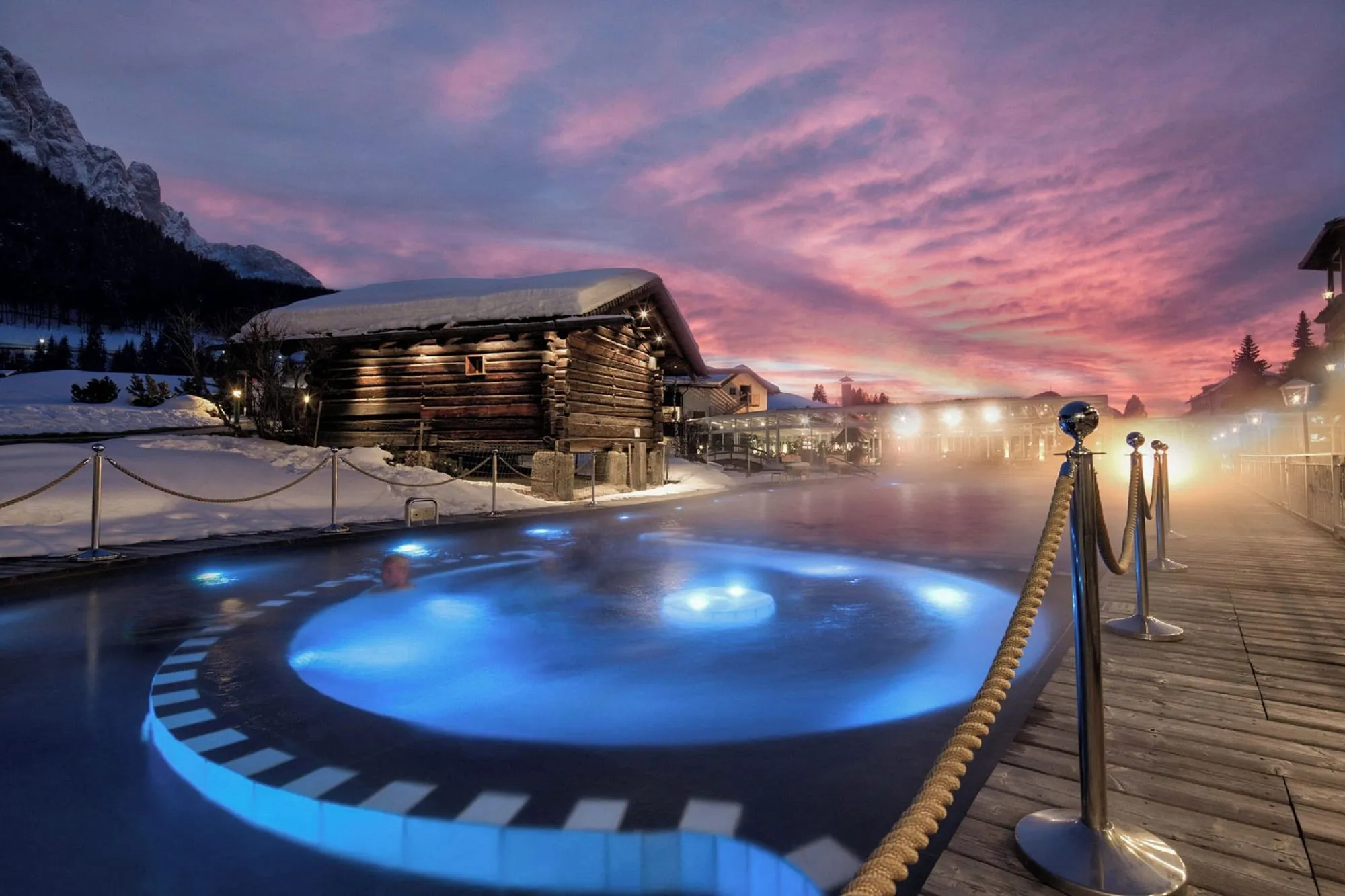 Alpenroyal Grand Hotel: the heated outdoor pool at dusk