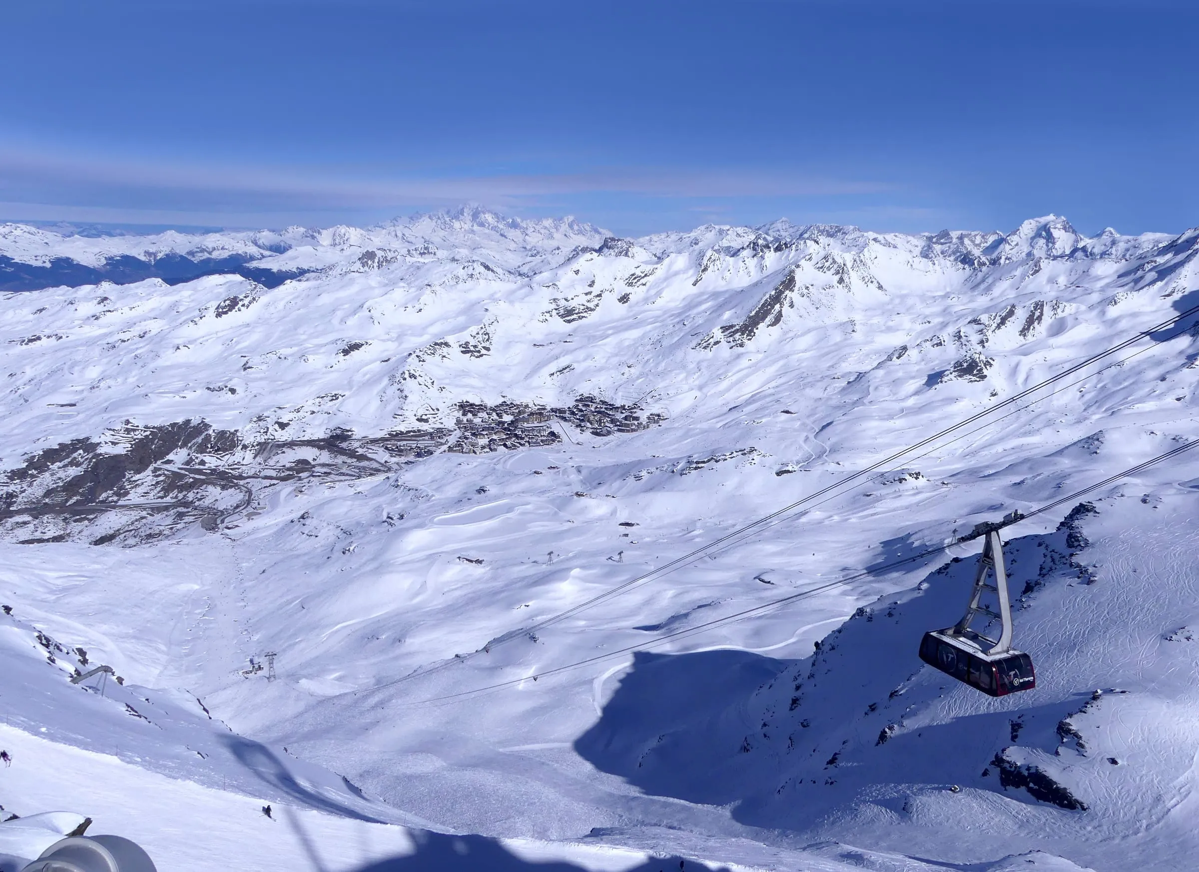 The Caron cable car above Val Thorens, with the snow-covered ski area below