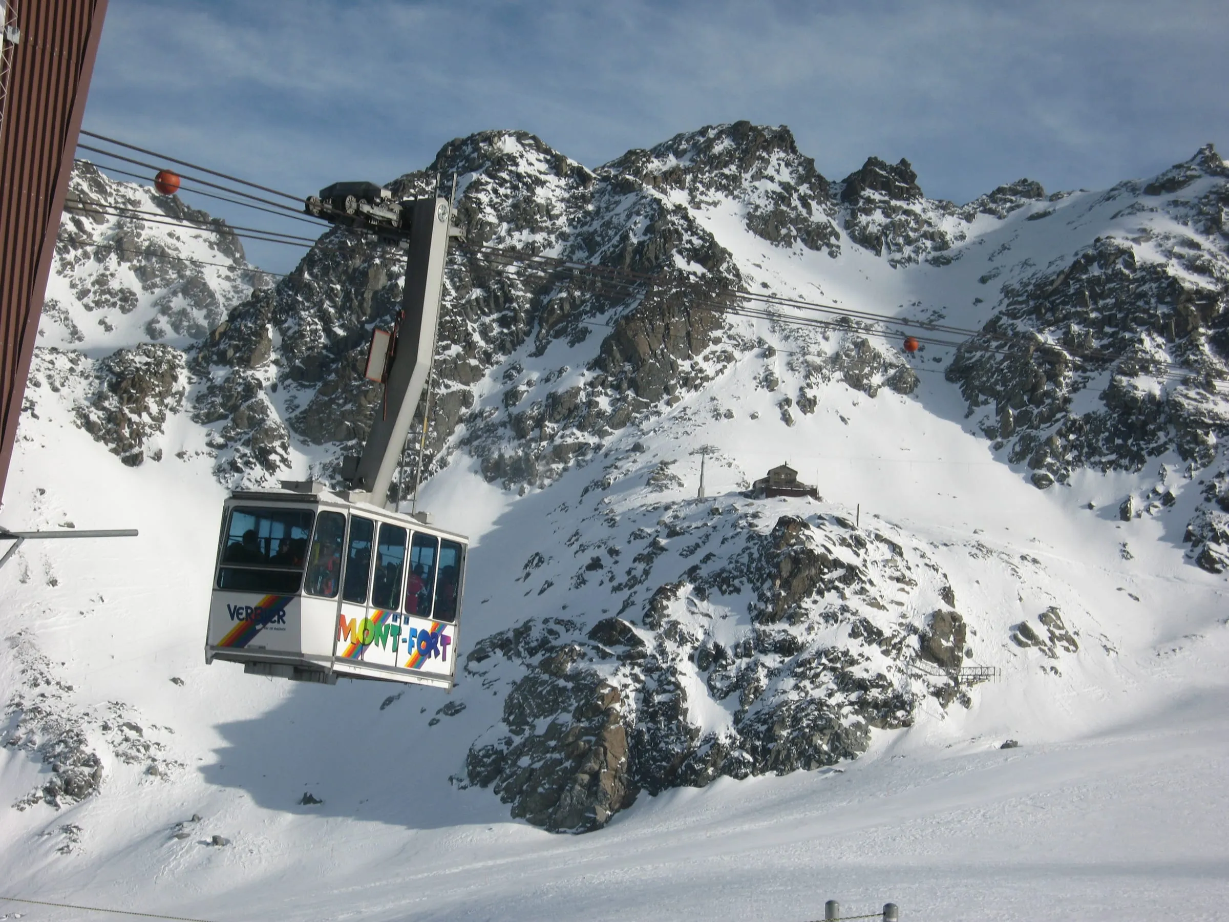 Cable car cabin climbing towards Mont-Fort above Verbier