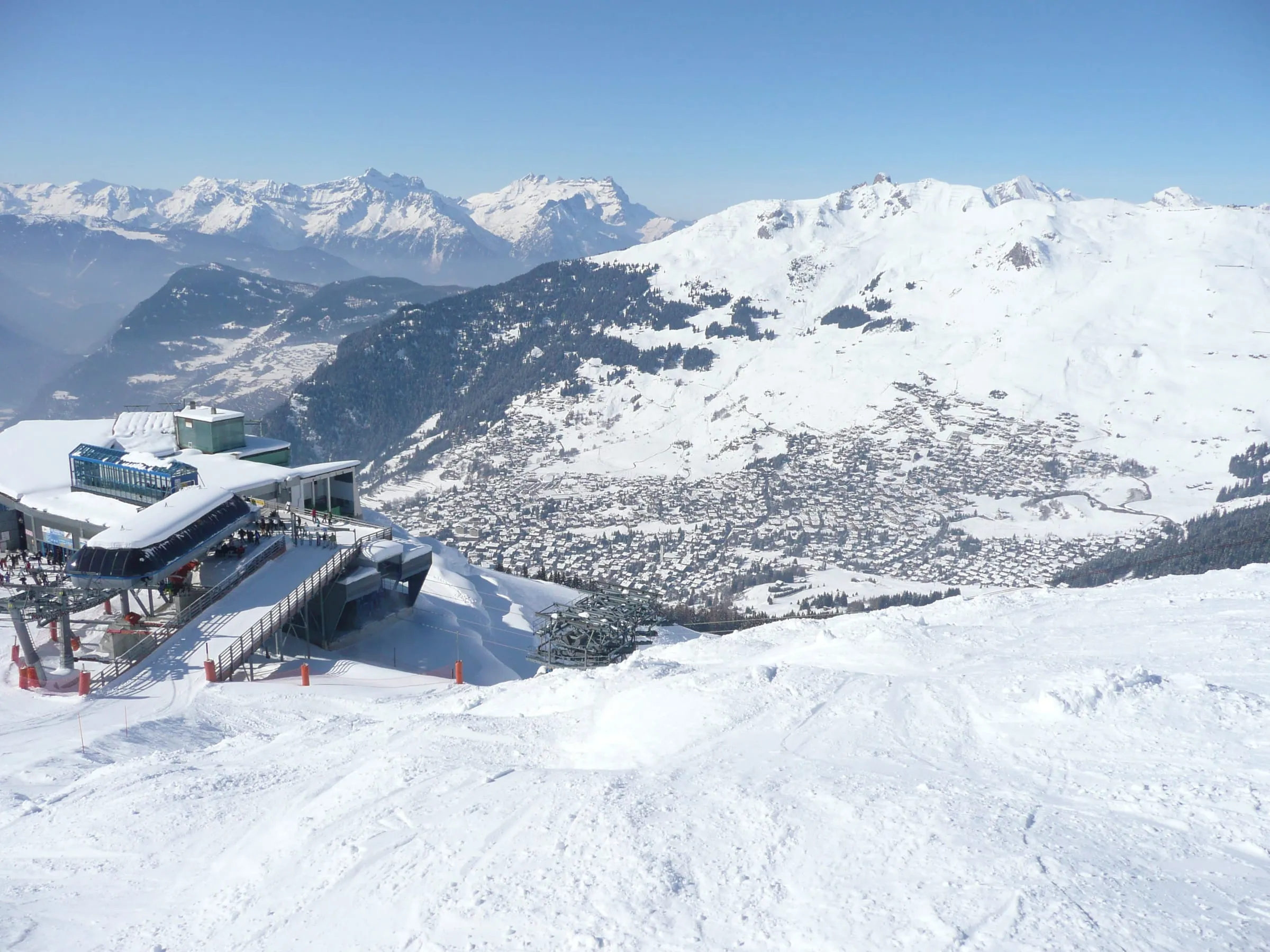 Les Ruinettes lift station above Verbier, with the village and the valley below