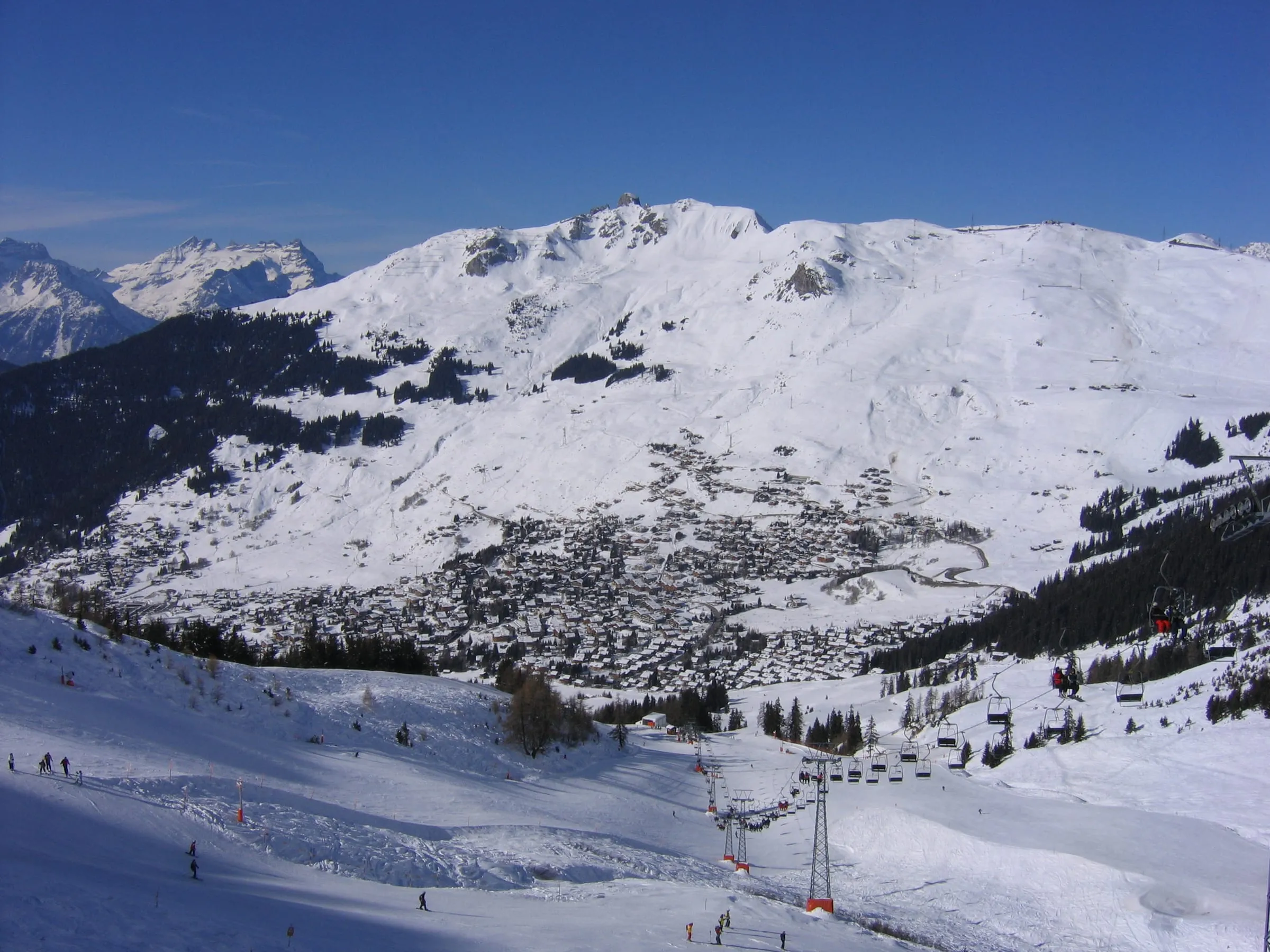 Verbier in winter, spread across the slope below its ski area