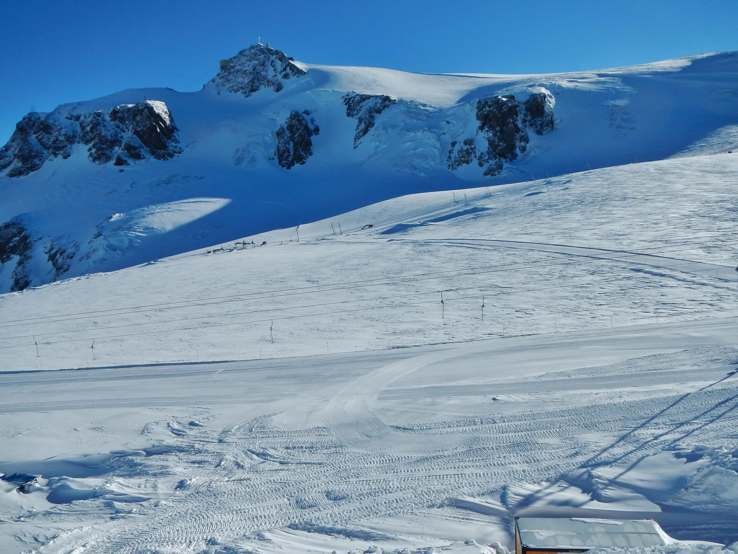 Wide groomed pistes on the Theodul Glacier above Zermatt, below the Klein Matterhorn
